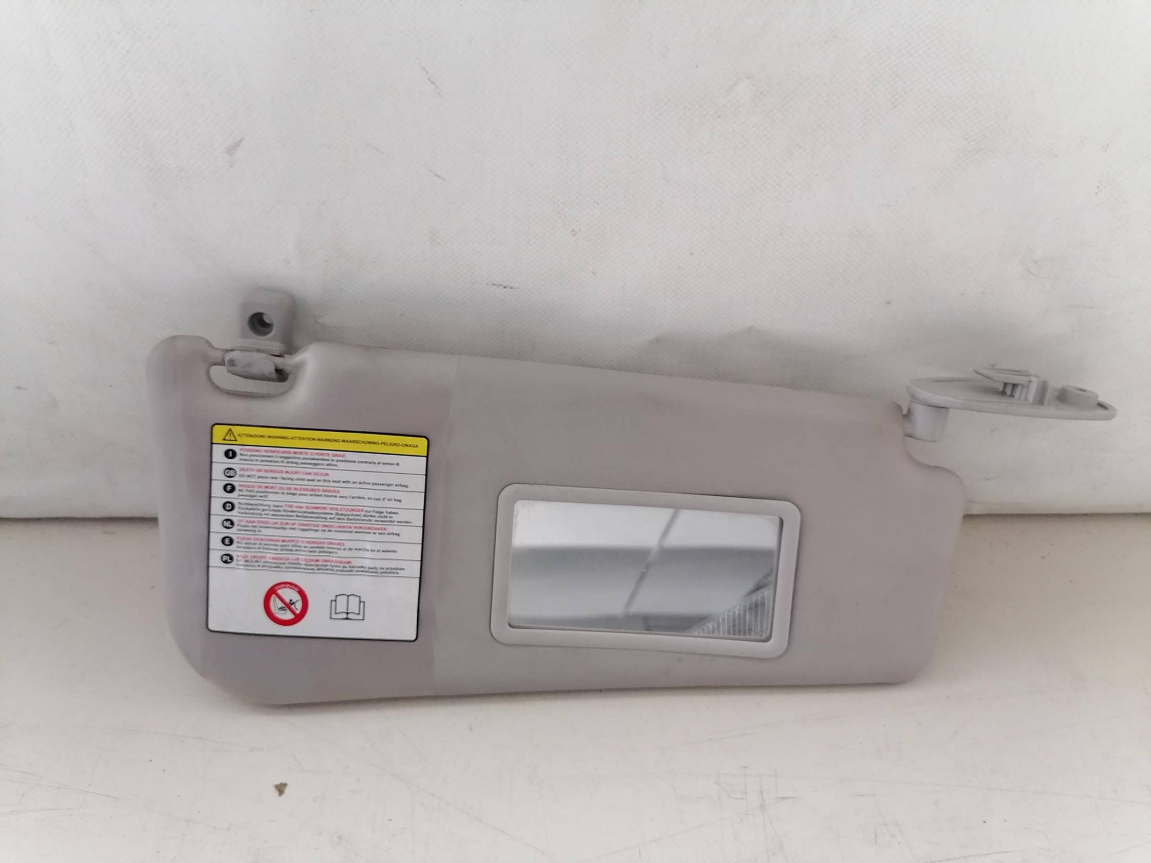 Aletta parasole parabrezza dx.